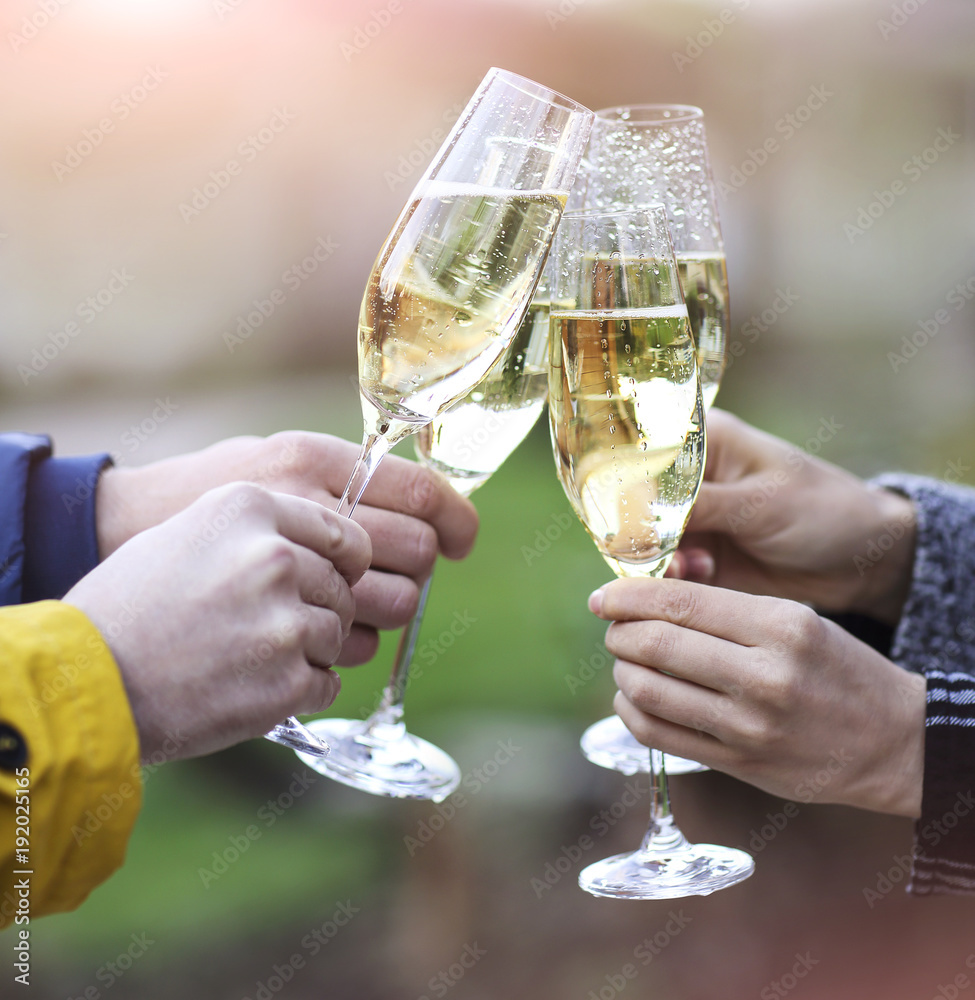 Party with sparkling champagne glasses outdoors