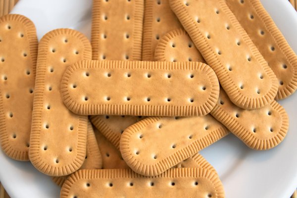 Por que alguns tipos de bolacha têm furinhos?